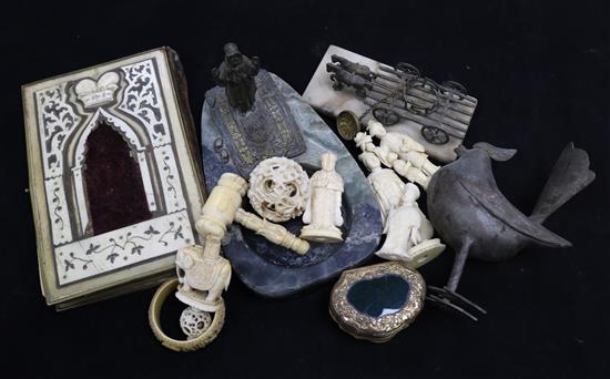 A gilt snuff box, an Arab ashtray, a Chinese stand, ivories, etc.